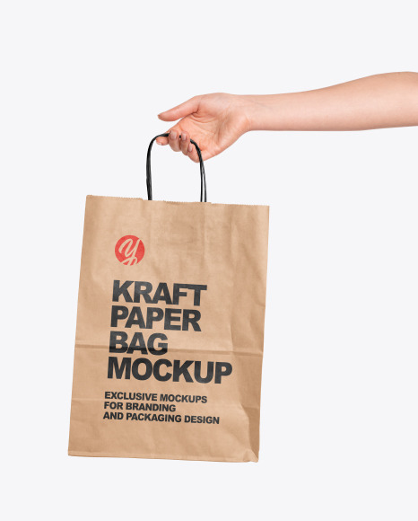 Hand Holding a Paper Bag Mockup