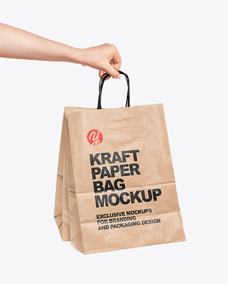 Hand Holding a Paper Bag Mockup