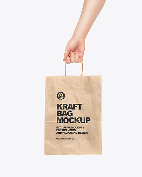 Hand w/ Paper Bag Mockup