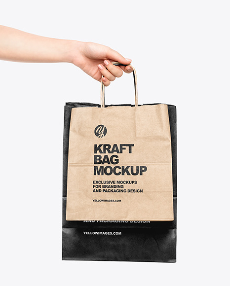 Hand w/ Two Paper Bags Mockup