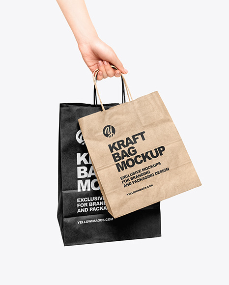 Hand w/ Two Paper Bags Mockup