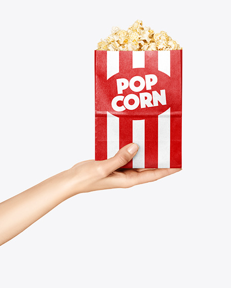 Paper Package w/ Popcorn in a Hand Mockup