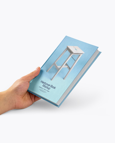 Hardcover Book in a Hand Mockup